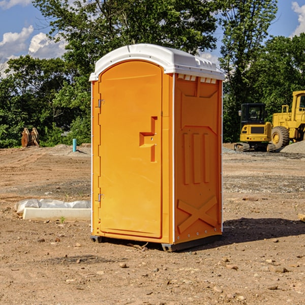 how often are the portable restrooms cleaned and serviced during a rental period in Sims Michigan